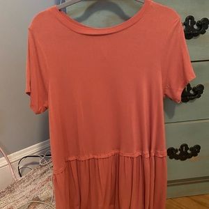 Long line baby doll coral colored top